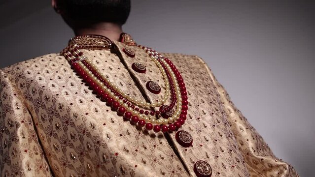 Indian Groom Wedding Jewellery, Men's pearl necklace, groom getting ready Closeup