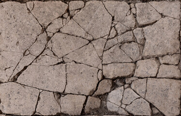 Old aged damaged marble bumpy uneven blocks. Trip pitted grunge granite tile cobble. Cragged grimy retro cranny frayed run track. Crannied dirtied shabby smashed gaping rustic big holes for 3d design