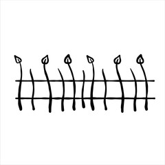 Doodle fence cemetery. Decoration of grave for Halloween.