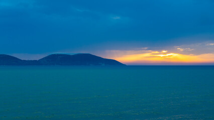 sunset over the Sazan island before storm, Albania