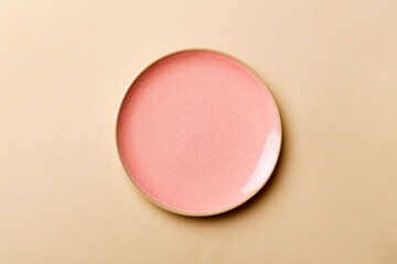 Top view of isolated of colored background empty round pink plate for food. Empty dish with space for your design