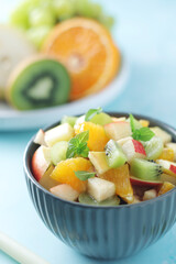Fototapeta na wymiar A bowl with fresh fruit salad 