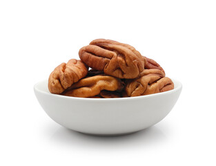 Pecan nuts in ceramic bowl isolated on white background  