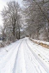 Fototapeta na wymiar Snow covered lane in the Scottish Borders in the United Kingdom 