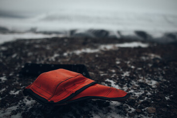 Flare gun for polar bear protection in orange cover within the Arctic mountains of Svalbard