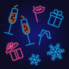 Glowing neon set of new year elements. Celebration of the New Year with glasses of champagne, gifts, carnival attributes and snowfall. Romantic winter evening.