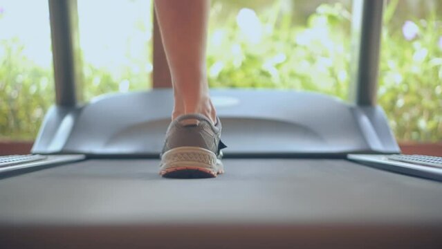 Treadmill workout interval training in home gym