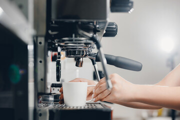 Cafe process, barista do coffee drink on professional machine