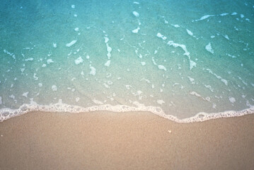 Fototapeta na wymiar beach wave with sand top view