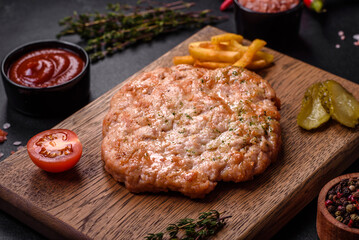 Delicious fresh grilled turkey meat steak with spices and herbs