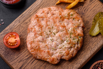 Delicious fresh grilled turkey meat steak with spices and herbs