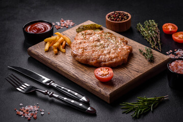Delicious fresh grilled turkey meat steak with spices and herbs