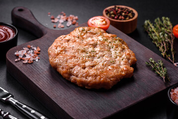 Delicious fresh grilled turkey meat steak with spices and herbs