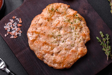 Delicious fresh grilled turkey meat steak with spices and herbs