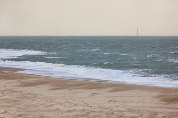 Fototapeta na wymiar Corduan lighthouse and atlantic ocean. Le verdon sur mer. France