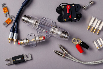 accessories for installing car audio components. Light background. Top view - 555885522