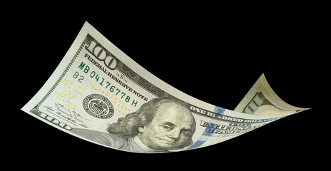 Hundred US dollars banknote, isolated on black background