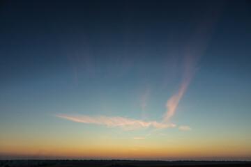 Obraz premium sunset sky with multicolor clouds. Dramatic twilight sky background