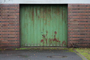 old rusted green garage door