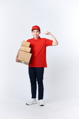 Portrait of Strong handsome delivery man flexing his muscle and holding pizza box packages.