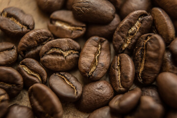Falling Roasted Coffee Beans, Macro Shot, close-up.