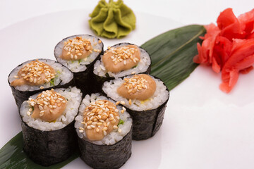 Vegetable sushi with cucumber and sauce, with wasabi and ginger
