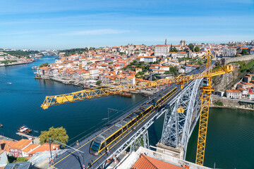 Bridge, crane, train and city views in Porto, Portugal