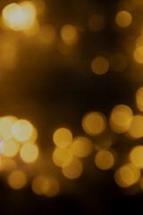 Abstract background of blurred yellow lights for design. Lights bokeh dis focus. Christmas background