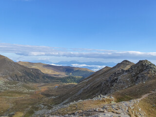 Panoramic view of mountain peak Kreiskogel and Scharfes Eck, Seetal Alps, Styria (Steiermark), Austria, Europe. Idyllic hiking trails in sunny summer over alpine green pastures and ridges