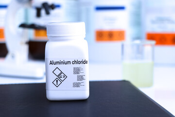 Aluminium chloride in bottle , chemical in the laboratory and industry
