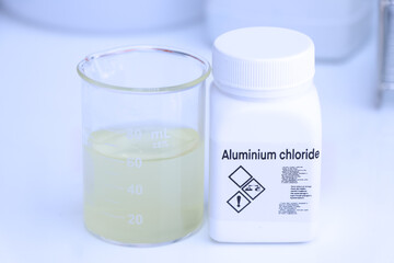Aluminium chloride in bottle , chemical in the laboratory and industry