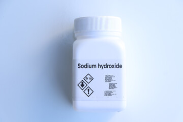 sodium hydroxide in bottle , chemical in the laboratory and industry