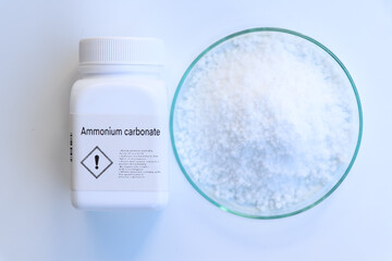 Ammonium carbonate in bottle , chemical in the laboratory and industry