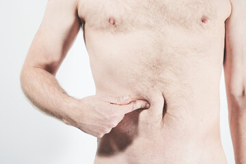 Naklejka premium Male body showing pain in belly