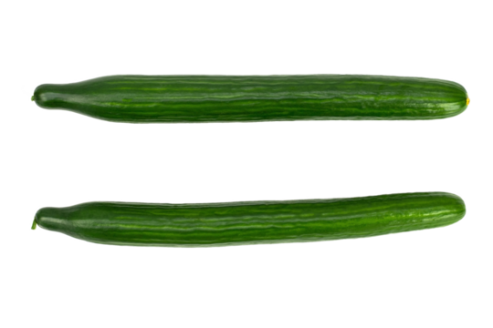 Fresh long and green cucumber on white backkground. Raw vegan food concept.