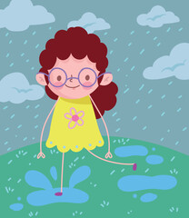 girl playing with rain water