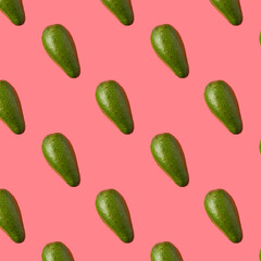 Avocado pattern on pink background. Top view.