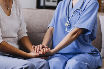 Obraz premium Homecare nursing service and elderly people cardiology healthcare. Close up of young hispanic female doctor nurse check mature caucasian man patient heartbeat using stethoscope during visit