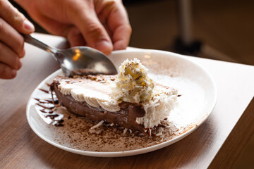 

cake with chocolate frosting, lemon, strawberry, corn, passion fruit