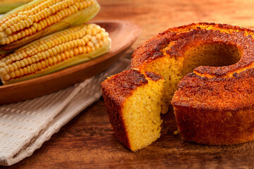 

cake with chocolate frosting, lemon, strawberry, corn, passion fruit