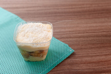 

cake with chocolate frosting, lemon, strawberry, corn, passion fruit