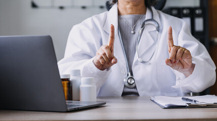 Homecare nursing service and elderly people cardiology healthcare. Close up of young hispanic female doctor nurse check mature caucasian man patient heartbeat using stethoscope during visit