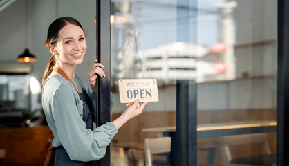 Startup successful small business owner sme beauty girl standing at coffee shop with open sign...