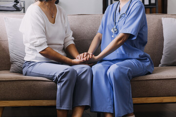 Obraz premium Homecare nursing service and elderly people cardiology healthcare. Close up of young hispanic female doctor nurse check mature caucasian man patient heartbeat using stethoscope during visit