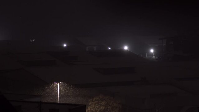 Winter night dark horror scene with snow fall blizzard