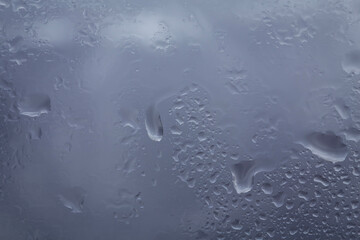 Drops of rain on glass