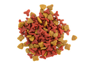 Dry meat food for pets on a white background. Heap of red dry dog food top view. Daily diet for pets. Dry cat food on a white background.