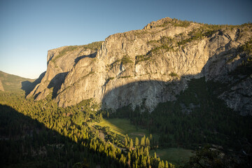 Eagle Tower Rises High Over The Valley Floor In Yosemite