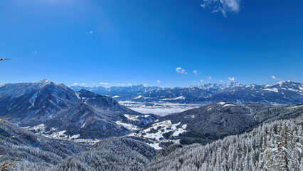 Scenic view of snow capped mountain peak Dobratsch, Julian Alps and the Karawanks (Karawanken) seen...
