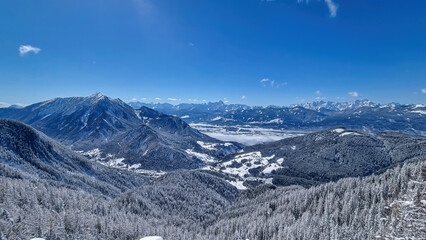 Scenic view of snow capped mountain peak Dobratsch, Julian Alps and the Karawanks (Karawanken) seen...